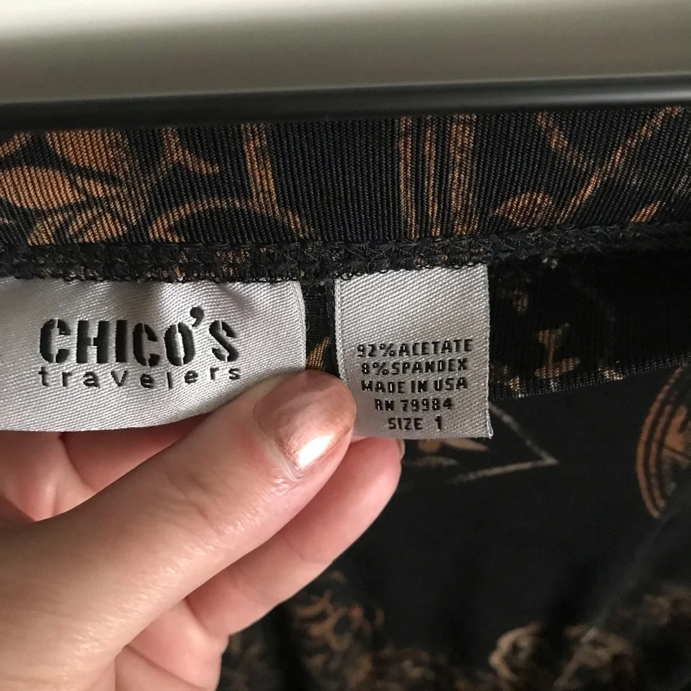 Chico’s long swing black skirt with‎ bronze design